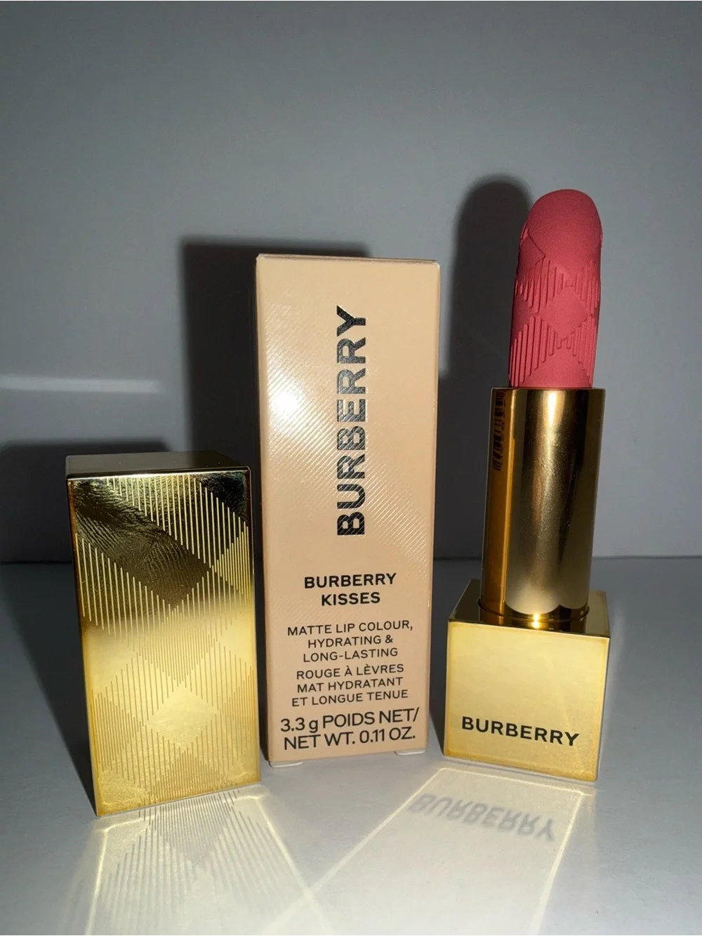 Burberry Matte Lipstick in Deep Peaxh with Gold magnetic lid closing Case